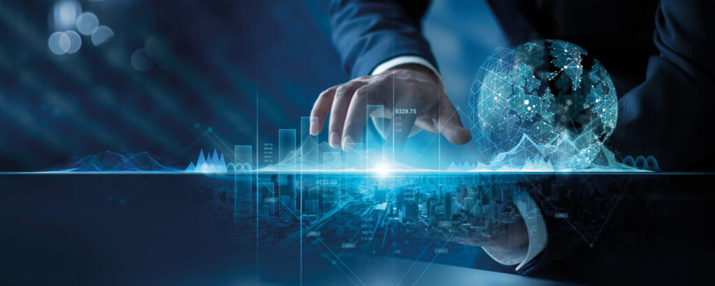 Banner, na tle nowoczesne miasto, na pierwszym planie dłoń sięgająca po cały świat